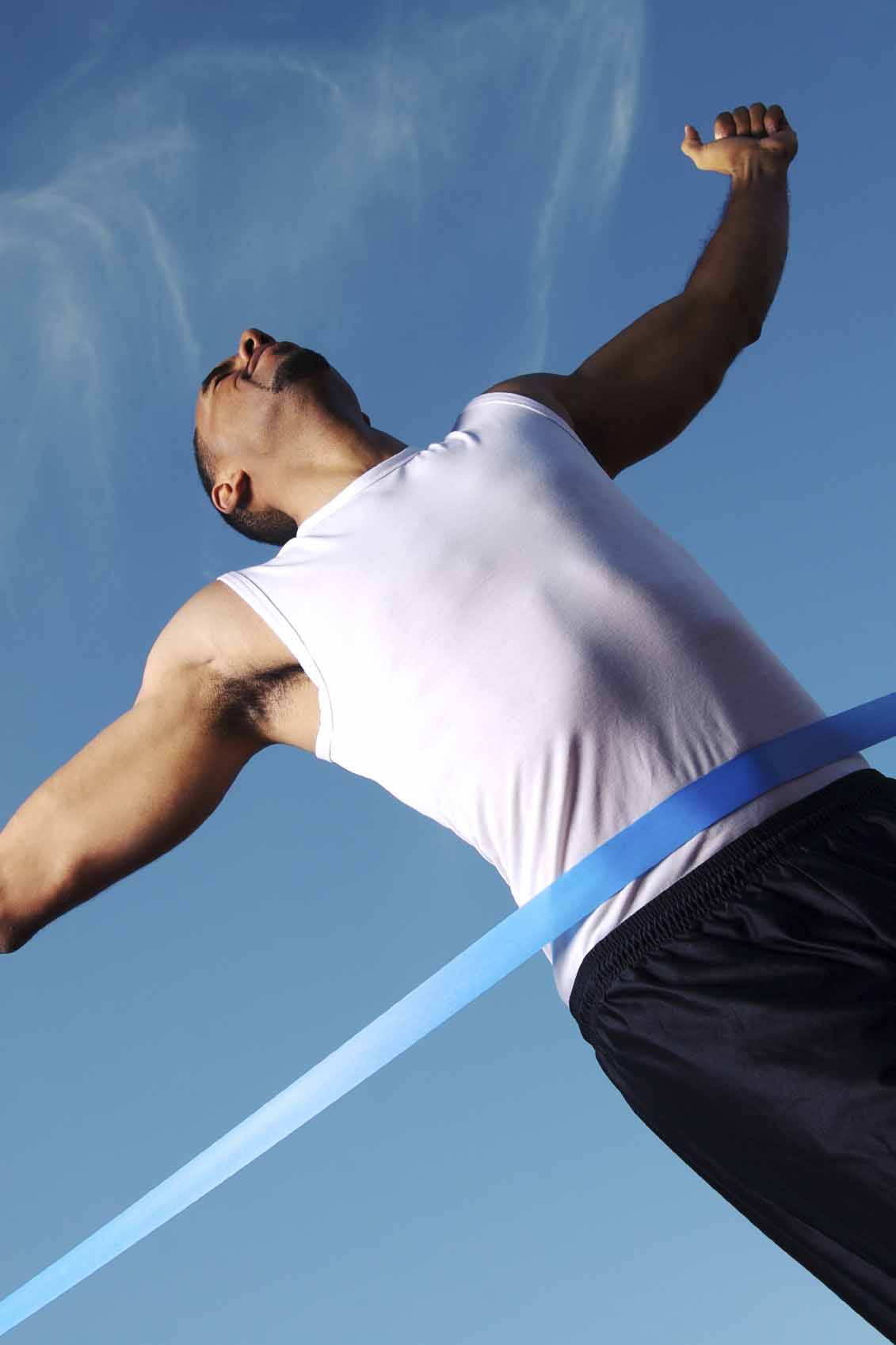 Runner crosses the finish line victoriously
